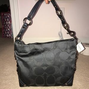 Beautiful brand new coach purse. Never used